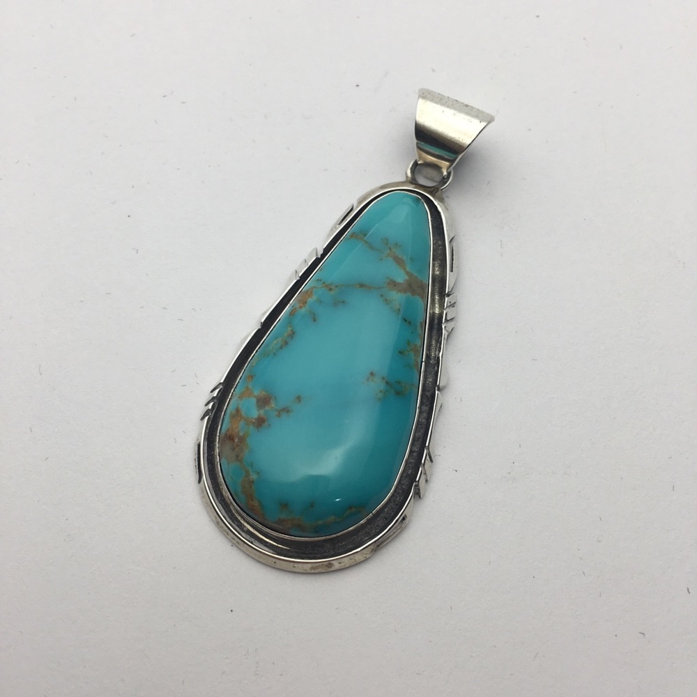 Turquoise in sterling silver pendant Navajo